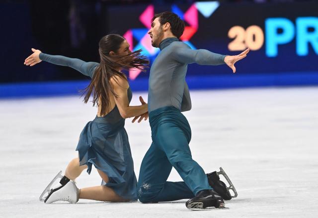 France's Laurence Fournier Beaudry and Guillaume Cizeron perform during the Ice Dance Free Dance program of the 2026 ISU Figure Skating World Championships in Prague, Czech Republic on March 28, 2026. (Photo by Michal Cizek / AFP)