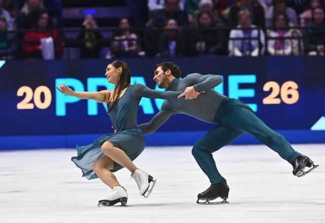 France's Laurence Fournier Beaudry and Guillaume Cizeron perform during the Ice Dance Free Dance program of the 2026 ISU Figure Skating World Championships in Prague, Czech Republic on March 28, 2026. (Photo by Michal Cizek / AFP)