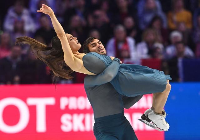 France's Laurence Fournier Beaudry and Guillaume Cizeron perform during the Ice Dance Free Dance program of the 2026 ISU Figure Skating World Championships in Prague, Czech Republic on March 28, 2026. (Photo by Michal Cizek / AFP)