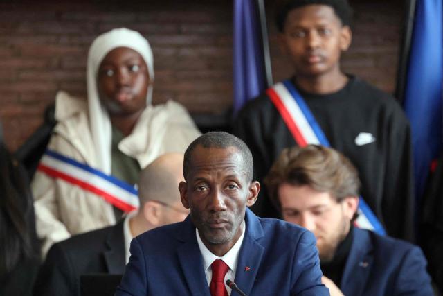 (FILES) Saint-Denis' Mayor Bally Bagayoko chairs the first session of the newly-elected city council in Saint-Denis, northern Paris, on March 21, 2026. The LFI Mayor of Saint-Denis announced to AFP on March 28, 2026 that he would be filing a complaint after a segment on CNews about him was deemed racist, a claim the channel rejects. In a segment broadcast on March 27, 2026 on CNews psychologist Jean Doridot made remarks during a debate about the first days of the Mayors term. (Photo by Ludovic MARIN / AFP)