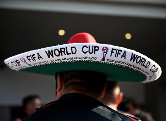 A Mexican fan arrives before the inauguration of Banorte Stadium (formerly known as Azteca), for a friendly match between Mexico and Portugal, in Mexico City on March 28, 2026. (Photo by Carl de Souza / AFP)