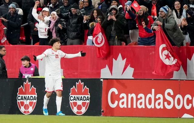 Tunisia's forward #26 Sebastian Tounekti celebrates scoring his team's first goal during a friendly football match between Haiti and Tunisia at BMO Field in Toronto, Canada, on March 28, 2026. (Photo by Geoff Robins / AFP)