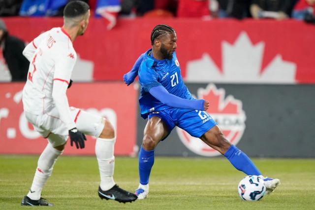 Haiti's forward #21 Josue Casimir and Tunisia's defender #05 Adem Arous vies for the ball during a friendly football match between Haiti and Tunisia at BMO Field in Toronto, Canada, on March 28, 2026. (Photo by Geoff Robins / AFP)