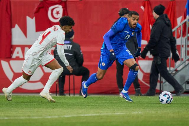 Haiti's forward #19 Yassin Fortune and Tunisia's defender #14 Ghaieth Zaalouni vie for the ball during a friendly football match between Haiti and Tunisia at BMO Field in Toronto, Canada, on March 28, 2026. (Photo by Geoff Robins / AFP)
