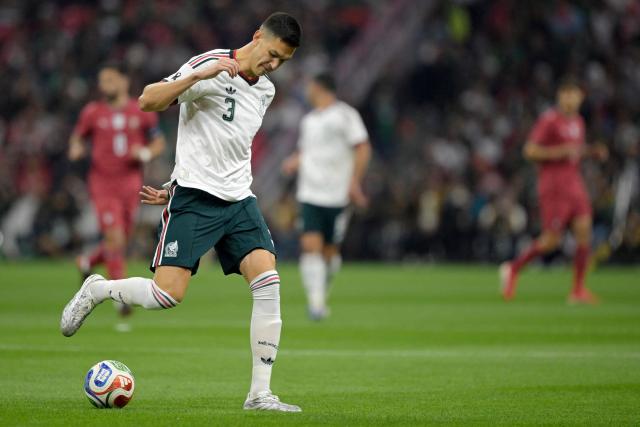 Mexico's defender #03 Cesar Montes runs with the ball during a friendly football match between Mexico and Portugal at the Banorte (formerly known as Azteca) Stadium in Mexico City on March 28, 2026. (Photo by Alfredo ESTRELLA / AFP)