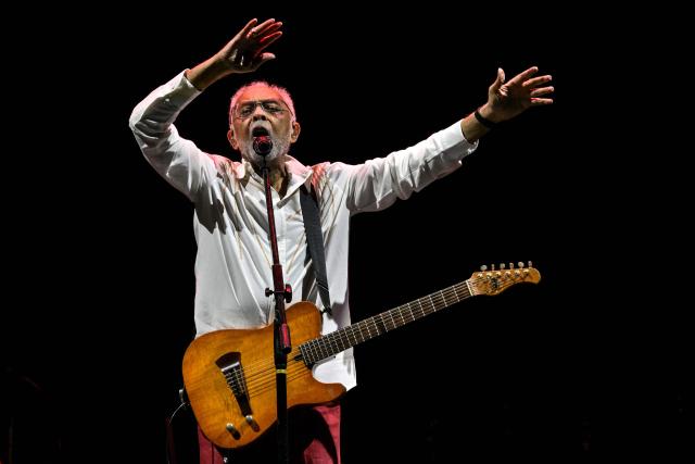 Brazilian musician and songwriter Gilberto Gil performs on his 'Gil Tempo Rei Last tour' at Allianz Parque stadium in Sao Paulo, Brazil on March 28, 2026. (Photo by Nelson ALMEIDA / AFP)