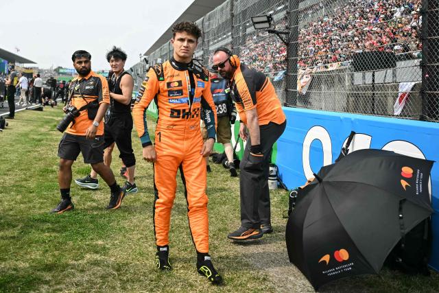 McLaren's British driver Lando Norris is seen before the start of the Formula One Japanese Grand Prix at the Suzuka circuit in Suzuka, Mie prefecture on March 29, 2026. (Photo by ANDREW CABALLERO-REYNOLDS / AFP)