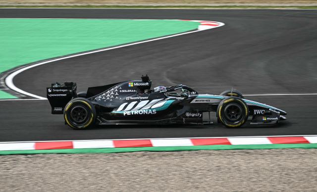 Mercedes' British driver George Russell drives during the Formula One Japanese Grand Prix at the Suzuka circuit in Suzuka, Mie prefecture on March 29, 2026. (Photo by Philip FONG / AFP)