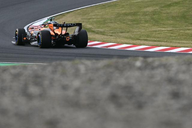 McLaren's Australian driver Oscar Piastri leads during the Formula One Japanese Grand Prix at the Suzuka circuit in Suzuka, Mie prefecture on March 29, 2026. (Photo by ANDREW CABALLERO-REYNOLDS / AFP)