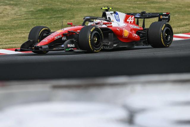 Ferrari's British driver Lewis Hamilton drives during the Formula One Japanese Grand Prix at the Suzuka circuit in Suzuka, Mie prefecture on March 29, 2026. (Photo by ANDREW CABALLERO-REYNOLDS / AFP)