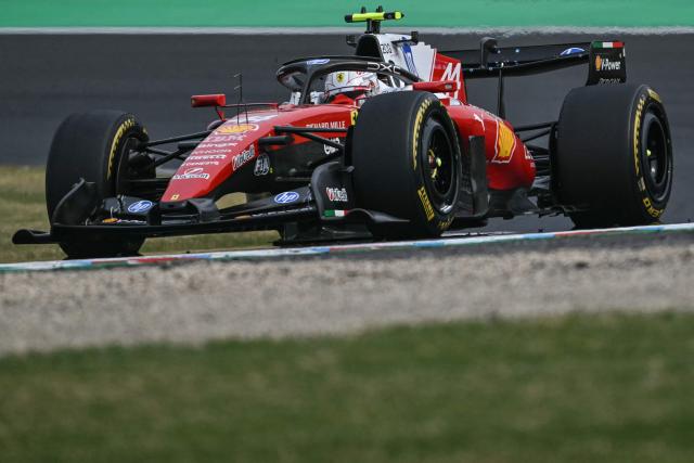 Ferrari's British driver Lewis Hamilton drives during the Formula One Japanese Grand Prix at the Suzuka circuit in Suzuka, Mie prefecture on March 29, 2026. (Photo by ANDREW CABALLERO-REYNOLDS / AFP)