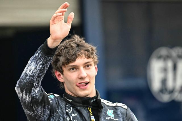Mercedes' Italian driver Kimi Antonelli celebrates at the parc ferme after winning the Formula One Japanese Grand Prix at the Suzuka circuit in Suzuka, Mie prefecture on March 29, 2026. (Photo by Toshifumi KITAMURA / AFP)