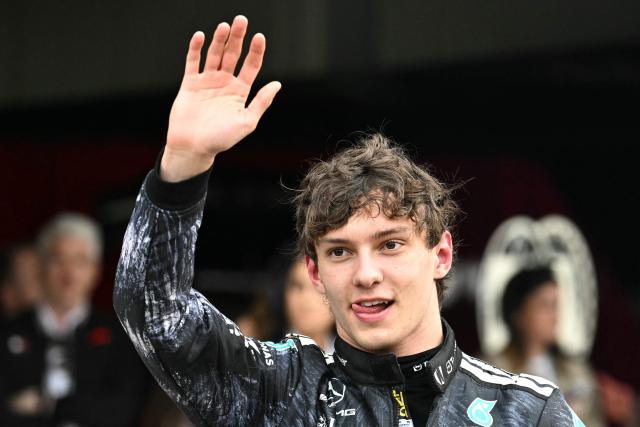 Mercedes' Italian driver Kimi Antonelli celebrates at the parc ferme after winning the Formula One Japanese Grand Prix at the Suzuka circuit in Suzuka, Mie prefecture on March 29, 2026. (Photo by Philip FONG / AFP)