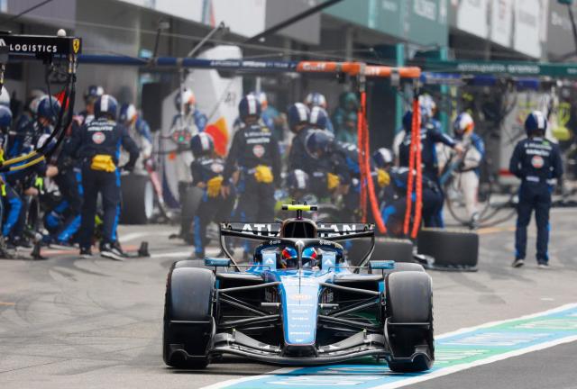 Williams' Spanish driver Carlos Sainz leaves after a pit stop during the Formula One Japanese Grand Prix at the Suzuka circuit in Suzuka, Mie prefecture on March 29, 2026. (Photo by FRANCK ROBICHON / POOL / AFP)