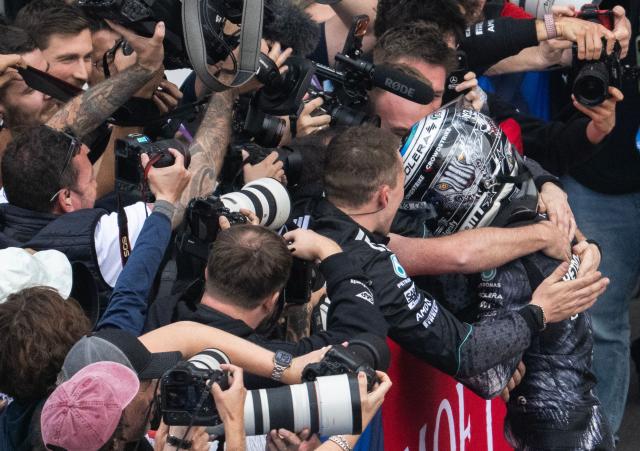 Mercedes' Italian driver Kimi Antonelli celebrates at the parc ferme after winning the Formula One Japanese Grand Prix at the Suzuka circuit in Suzuka, Mie prefecture on March 29, 2026. (Photo by ANDREW CABALLERO-REYNOLDS / AFP)