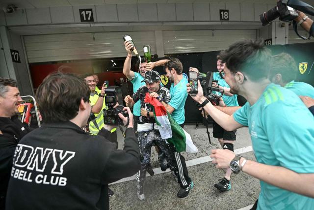 Mercedes' Italian driver Kimi Antonelli celebrates with his team after winning the Formula One Japanese Grand Prix at the Suzuka circuit in Suzuka, Mie prefecture on March 29, 2026. (Photo by Philip FONG / AFP)