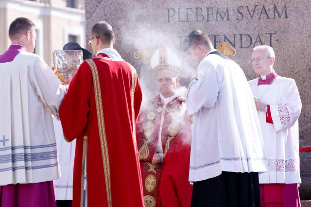 Pope Leo XIV leads a mass for Palm Sunday at St Peter's square in the Vatican on March 29, 2026. (Photo by REMO CASILLI / POOL / AFP)