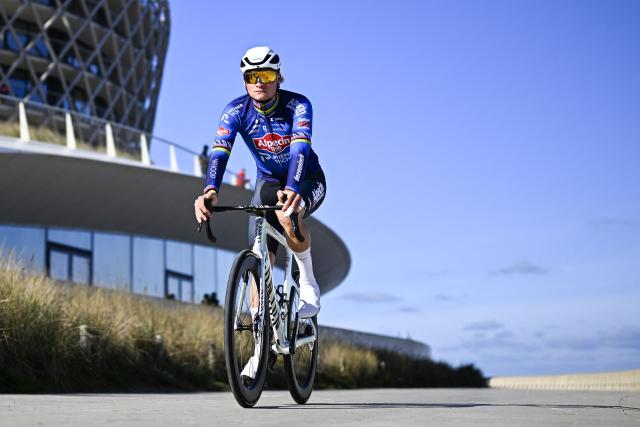 Alpecin-Premier Tech's Dutch rider Mathieu van der Poel arrives at the start of the men elite 'Middelkerke-Wevelgem - In Flanders Fields' one day cycling race, 240.8 km from Middelkerke to Wevelgem, on March 29, 2026. (Photo by JASPER JACOBS / Belga / AFP) / Belgium OUT