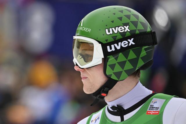 Austria's Jonas Schuster reacts during the final round of the Men's Individual Large Hill event at the FIS Jumping World Cup in Planica on March 29, 2026. (Photo by JURE MAKOVEC / AFP)