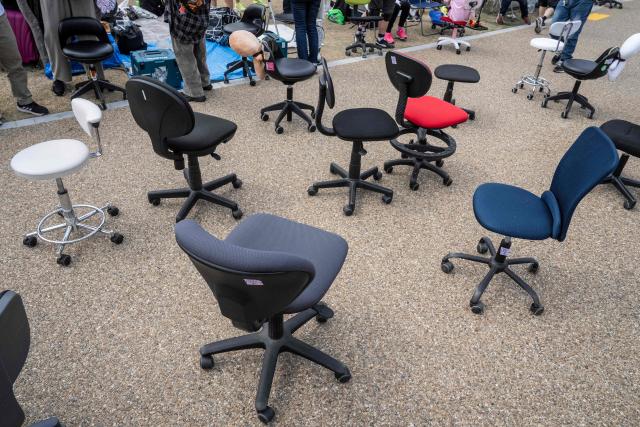 Office chairs are seen before the start of the ISU-1 Grand Prix in Kyotanabe, Kyoto prefecture on March 29, 2026. The ISU-1 Grand Prix is an endurance race supervised by the Japan Office Chair Racing Association (JORA), in which participants compete to see how many laps they can complete on office chairs over two hours. The event originated in 2010 in the Kirara shopping district of Kyotanabe, Kyoto Prefecture, and is now held at more than 20 locations across Japan. (Photo by Yuichi YAMAZAKI / AFP)