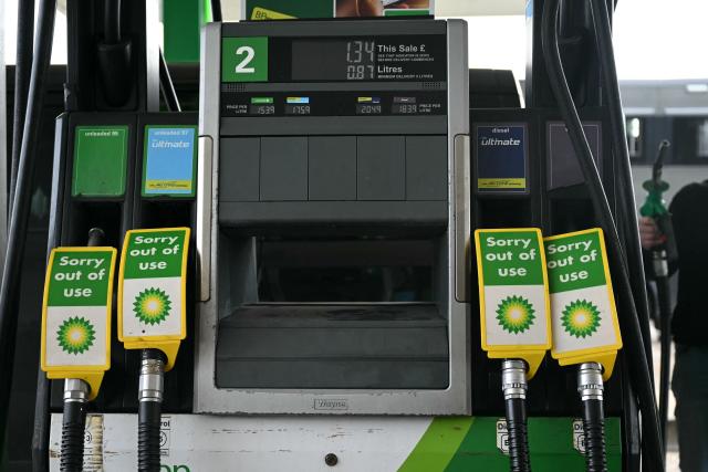 Out of Use pumps for various grades of fuel are pictured at a petrol service station on the A3, north of Guildford in southern England on March 29, 2026. The average price of unleaded petrol has risen by more than 17p a litre since the end of February to over £1.50, according to fresh RAC data, as some petrol pumps are seeing shortages amid tight supply linked to the conflict in the Middle East. (Photo by JUSTIN TALLIS / AFP)