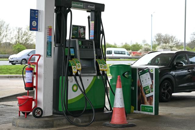 Out of Use pumps for various grades of fuel are pictured at a petrol service station on the A3, north of Guildford in southern England on March 29, 2026. The average price of unleaded petrol has risen by more than 17p a litre since the end of February to over £1.50, according to fresh RAC data, as some petrol pumps are seeing shortages amid tight supply linked to the conflict in the Middle East. (Photo by JUSTIN TALLIS / AFP)