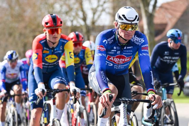 Alpecin-Premier Tech's Dutch rider Mathieu van der Poel (C) competes during the men elite 'Middelkerke-Wevelgem - In Flanders Fields' one day cycling race, 240,8 km from Middelkerke to Wevelgem, on March 29, 2026. (Photo by ELIAS ROM / Belga / AFP) / Belgium OUT