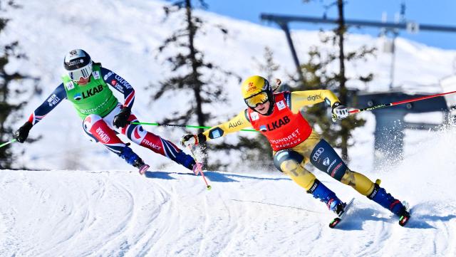 France's Marielle Berger Sabbatel and Germany's Daniela Maier compete in the women's finishing semi-final of the FIS Ski Cross World Cup at Dundret in Gaellivare, Sweden, on March 29, 2026. (Photo by Anders WIKLUND / TT NEWS AGENCY / AFP) / Sweden OUT