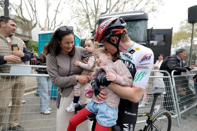 Team Visma-Lease a bike's Danish rider Jonas Vingegaard celebrates with his family winning the 2026 'Volta a Catalunya' cycling tour of Catalonia, after the seventh and last stage, a 95,1 km race between Barcelona and Barcelona, on March 29, 2026. (Photo by Josep LAGO / AFP)