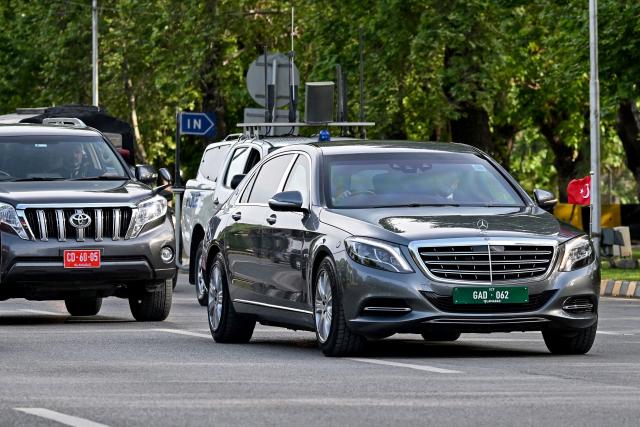 A motorcade of Turkey's Foreign Minister Hakan Fidan arrives at Pakistan's Ministry of Foreign Affairs premises in Islamabad on March 29, 2026. Foreign ministers from Pakistan, Saudi Arabia, Egypt and Turkey were expected to meet on March 29 for talks on the war in the Middle East, with Islamabad acting as a go-between between the United States and Iran. (Photo by Aamir QURESHI / AFP)