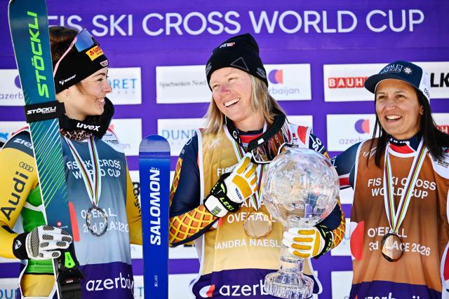 (L-R) Second-placed Germany's Daniela Maier, first-placed Sweden's Sandra Naslund and third-placed France's Marielle Berger Sabbatel celebrate on the podium after winning  the women's FIS Ski Cross World Cup at Dundret in Gaellivare, Sweden, on March 29, 2026. (Photo by Anders WIKLUND / TT News Agency / AFP) / Sweden OUT