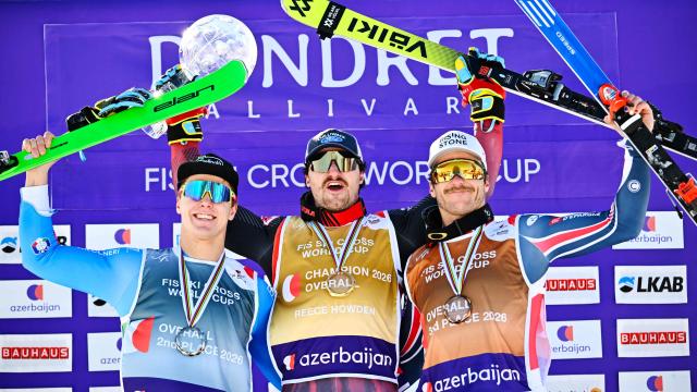 (L-R) Second-placed Italy's Simone Deromedis, first-placed Canada's Reece Howden and third-placed Italy's Edoardo Zorzi celebrate on the podium after winning the men's FIS Ski Cross World Cup at Dundret in Gaellivare, Sweden, on March 29, 2026. (Photo by Anders WIKLUND / TT News Agency / AFP) / Sweden OUT