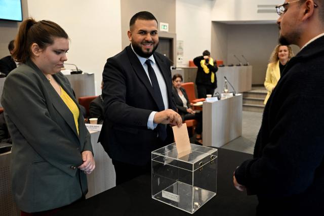 Aubervilliers' newly elected mayor Sofienne Karroumi votes for his nomination during the inaugural city council session at the city hall of Aubervilliers on March 29, 2026. (Photo by Blanca CRUZ / AFP)
