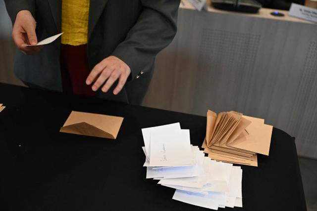 This photograph shows ballot papers during the nomination vote of the newly elected mayor at the inaugural city council session in Aubervilliers' the city hall on March 29, 2026. (Photo by Blanca CRUZ / AFP)