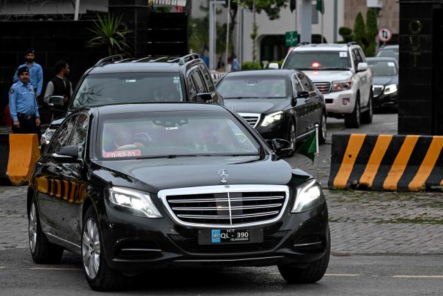A motorcade of Saudi Arabia's Foreign Minister Faisal bin Farhan departs from Pakistan's Ministry of Foreign Affairs premises in Islamabad on March 29, 2026. Foreign ministers from Pakistan, Saudi Arabia, Egypt and Turkey were expected to meet on March 29 for talks on the war in the Middle East, with Islamabad acting as a go-between between the United States and Iran. (Photo by Aamir QURESHI / AFP)