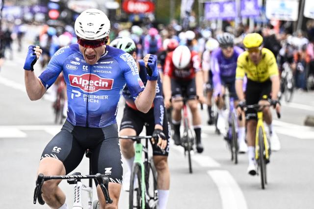 Belgian Jasper Philipsen of Alpecin-Premier Tech celebrates after winning the men elite 'Middelkerke-Wevelgem - In Flanders Fields' one day cycling race, 240.8 km from Middelkerke to Wevelgem, on March 29, 2026. (Photo by JASPER JACOBS / Belga / AFP) / Belgium OUT