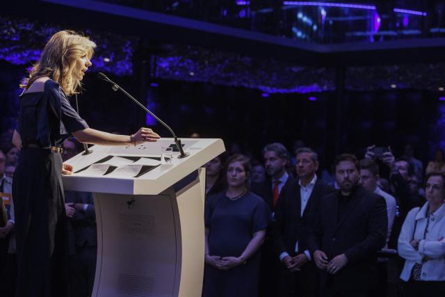 Far right party Vlaams Belang's politician Mercina Claesen (L) delivers a speech at the 'Vlaanderen Veilig' (Flanders Safe) meeting of Flemish far-right party Vlaams Belang (VB), in Brussels on March 29, 2026. (Photo by NICOLAS MAETERLINCK / Belga / AFP) / Belgium OUT