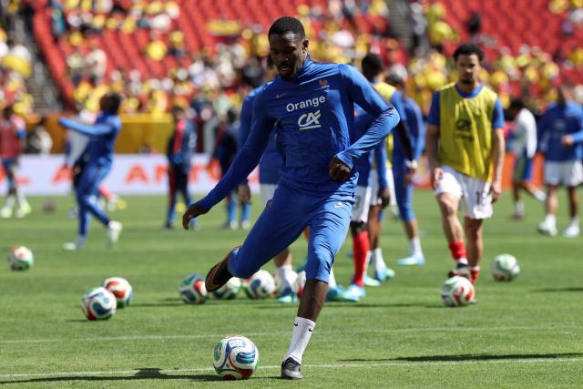 France's forward #09 Marcus Thuram warms up ahead of the friendly football match between Colombia and France at Northwest Stadium in Landover, Maryland, on March 29, 2026. (Photo by FRANCK FIFE / AFP)