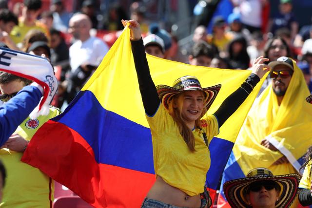 A Colombian fan cheers before the starts of a friendly football match between Colombia and France at Northwest Stadium in Landover, Maryland, on March 29, 2026. (Photo by FRANCK FIFE / AFP)