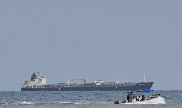 This view shows the crude oil tanker Sea Horse, flag of Hong Kong and carrying about 200,000 barrels of Russia-origin fuel originally bound for Cuba, at the coast of Puerto Cabello, Venezuela, on March 29, 2026. (Photo by Maryorin Mendez / AFP)