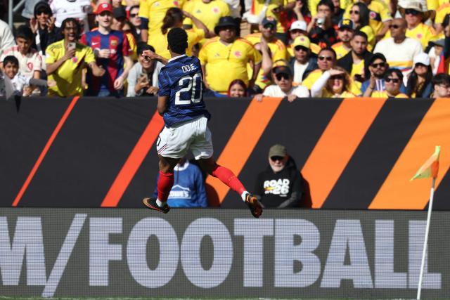 France's forward #20 Desire Doue celebrates after scoring his second goal during a friendly football match between Colombia and France at Northwest Stadium in Landover, Maryland, on March 29, 2026. (Photo by FRANCK FIFE / AFP)