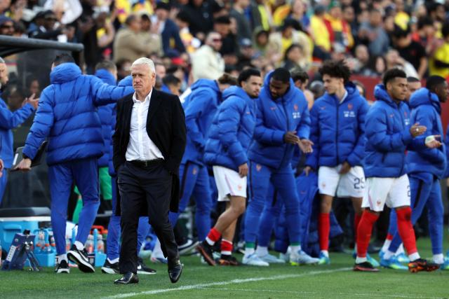 France's head coach Didier Deschamps walks on the pitch at the end of the 3-1 victory friendly football match between Colombia and France at Northwest Stadium in Landover, Maryland, on March 29, 2026. (Photo by FRANCK FIFE / AFP)