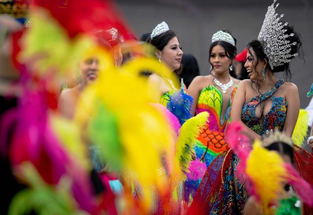 Women take part in the annual spring carnival parade in Mexico City on March 29, 2026. (Photo by Carl de Souza / AFP)