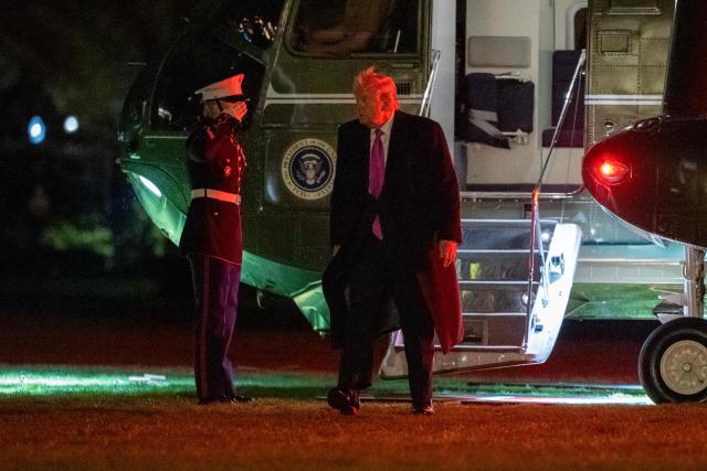 US President Donald Trump steps off Marine One on the South Lawn upon returning to the White House in Washington, DC, on March 29, 2026. Trump is returning from a weekend at his Mar-a-Lago resort. (Photo by Ken CEDENO / AFP)