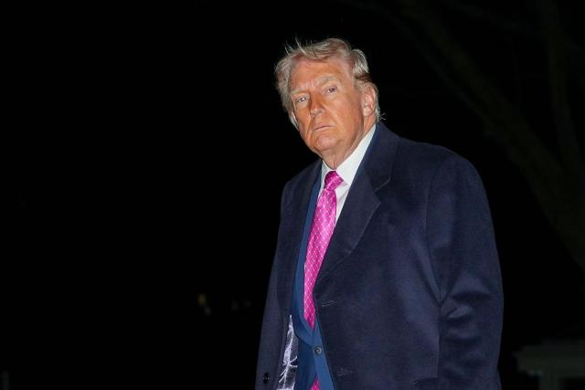 US President Donald Trump walks on the South Lawn upon returning to the White House in Washington, DC, on March 29, 2026. Trump is returning from a weekend at his Mar-a-Lago resort. (Photo by Ken CEDENO / AFP)