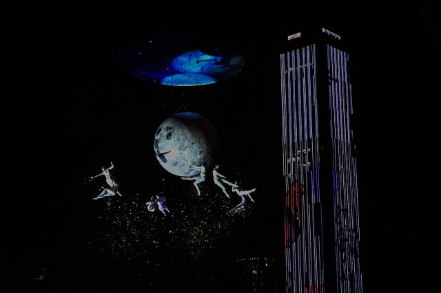 Dancers perform in the show 'Aria' by the Spanish company Zenit Aerial Ballet during the 2nd International Festival of Living Arts (FIAV) in Bogota, Colombia on March 29, 2026. (Photo by Luis ACOSTA / AFP)