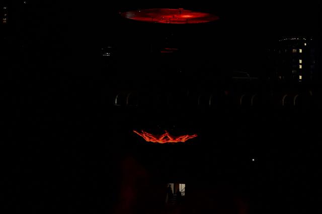 Dancers perform in the show 'Aria' by the Spanish company Zenit Aerial Ballet during the 2nd International Festival of Living Arts (FIAV) in Bogota, Colombia on March 29, 2026. (Photo by Luis ACOSTA / AFP)