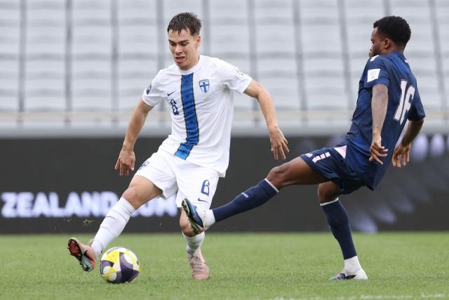 Finland's Oiva Jukkola (L) controls the ball during the international friendly football match between Cape Verde and Finland at Eden Park in Auckland on March 30, 2026. (Photo by Michael Bradley / AFP)