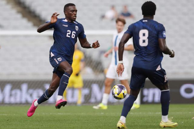 Cape Verde's Ieltsin Camoes (L) controls the ball during the international friendly football match between Cape Verde and Finland at Eden Park in Auckland on March 30, 2026. (Photo by Michael Bradley / AFP)
