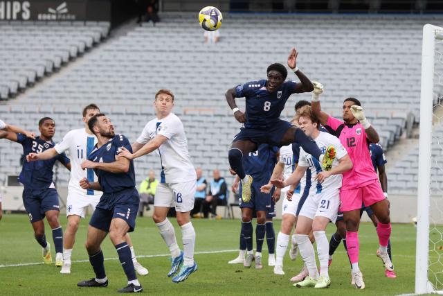 Cape Verde's Joao Paulo (centre R) clears the ball from a corner during the international friendly football match between Cape Verde and Finland at Eden Park in Auckland on March 30, 2026. (Photo by Michael Bradley / AFP)